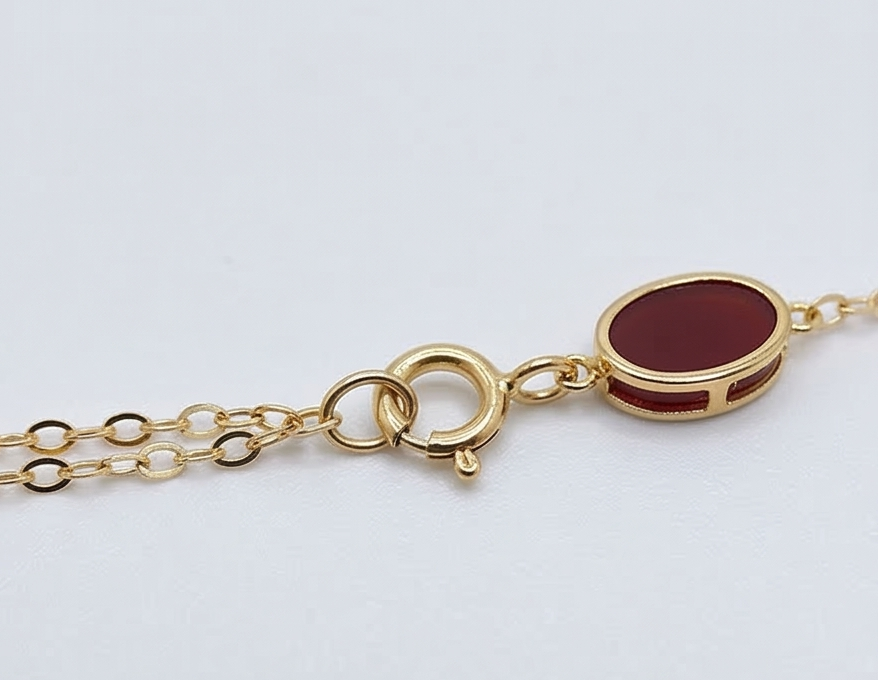 Golden aura: Garnet Glow Oval Station Bracelet