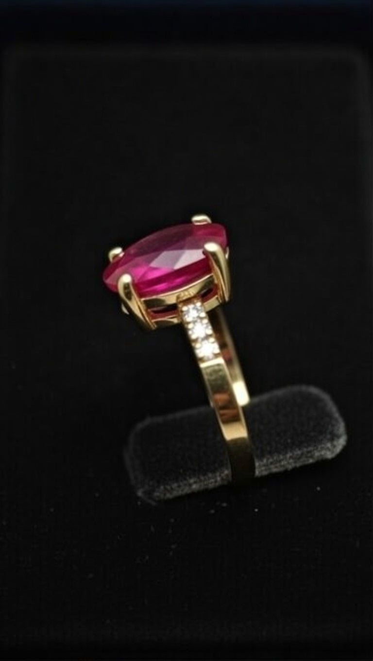 Heated Ruby Solitaire Ring in 18K yellow gold